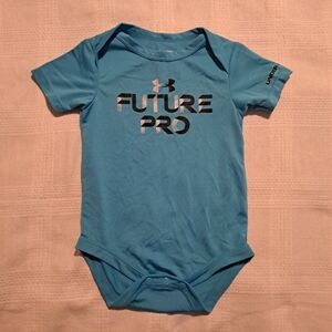 Under Armour boys 6/9 months blue body suit, snaps on the shoulder and bottom